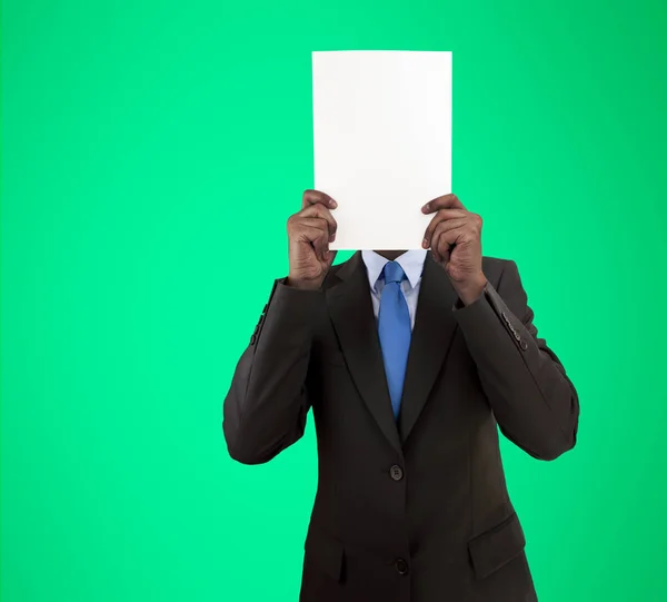 Verkställande Håller Ett Plakat Framför Hans Ansikte Och Isolerade Cutout — Stockfoto