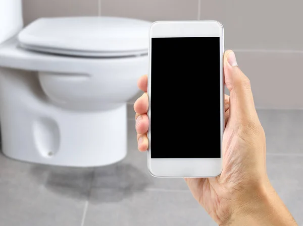 Hand Holding Smartphone Call Professional Repair Water Leak Toilet — Stock Photo, Image