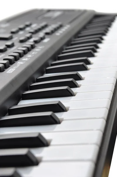 Close-up of music keyboard keys. close frontal view