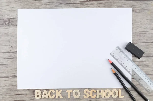 Potlood Gum Liniaal Met Blanco Papier Houten Achtergrond Terug Naar — Stockfoto