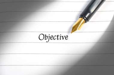 Dolma kalem üstünde defter kelime amacı ile