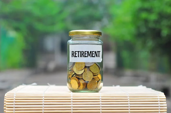 Coins Bottle Label Retirement Financial Concept — Stock Photo, Image