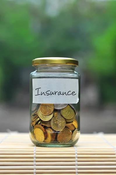 Coins Bottle Label Insurance Financial Concept — Stock Photo, Image