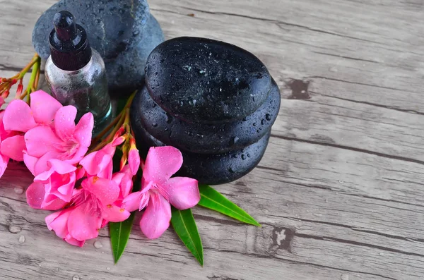 Essence Oil Flower Zen Stone Wood Background — Stock Photo, Image