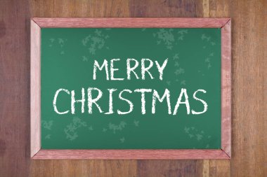 ahşap zemin üzerine yeşil yazı tahtası