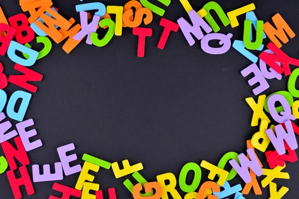 Colorful Alphabet letters  on background,close up