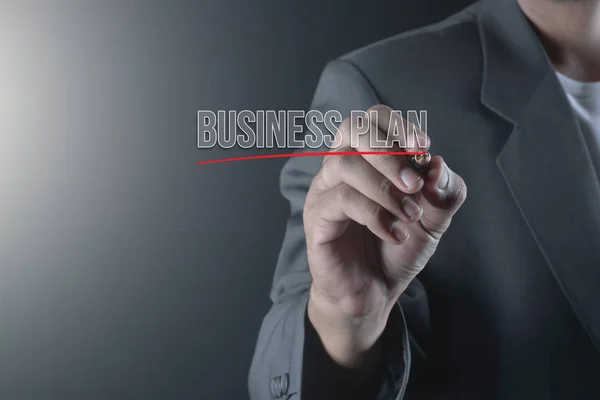 Hand of business man write or writing text BUSINESS PLAN — Stock Photo, Image