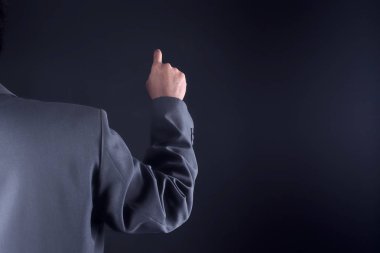 bir şey için işaret veya dokunmatik ekran dokunarak ile iş adamı