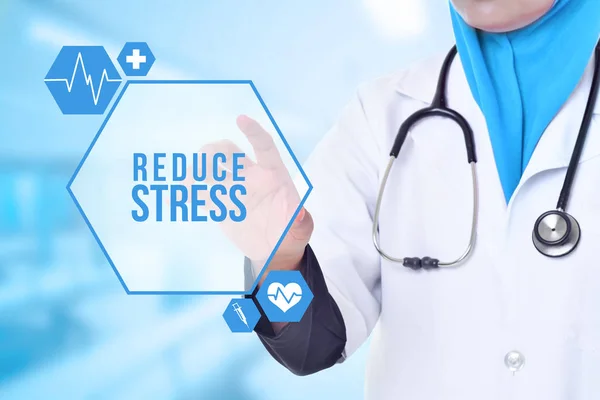 Doctor over blue clinic background. Medical and Healthcare Conce