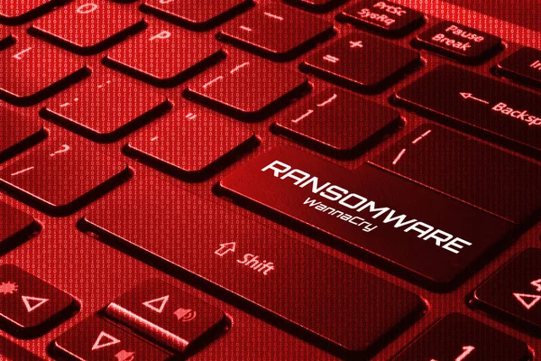 Keyboard with red back light and word RANSOMWARE - WannaCry — Stock Photo, Image