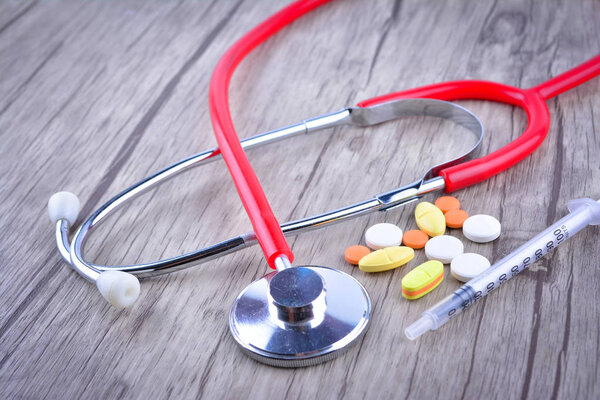Pills, Syringe and Stethoscope