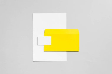 Marka / Kırtasiye Mock-Up - sarı ve beyaz - Antetli kağıdı (A4), Dl zarf, iş kartı (85x55mm)