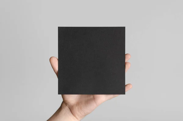 Black Square Flyer Invitation Mock Male Hands Holding Black Flyer — Stock Photo, Image