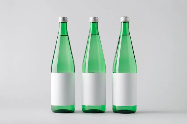 Vattenflaska Mock-Up-tre flaskor. Tom etikett — Stockfoto