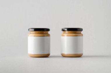 Fıstık / badem / fındık ezmesi kavanozu Mock-Up-iki kavanoz. Boş etiket