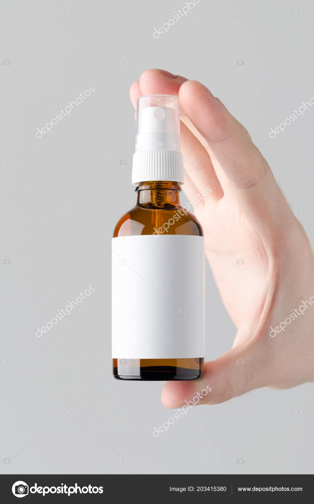 Download Amber Spray Bottle Mock Blank Label Male Hands Holding Amber Stock Photo Image By C Shablonstudio 203415380