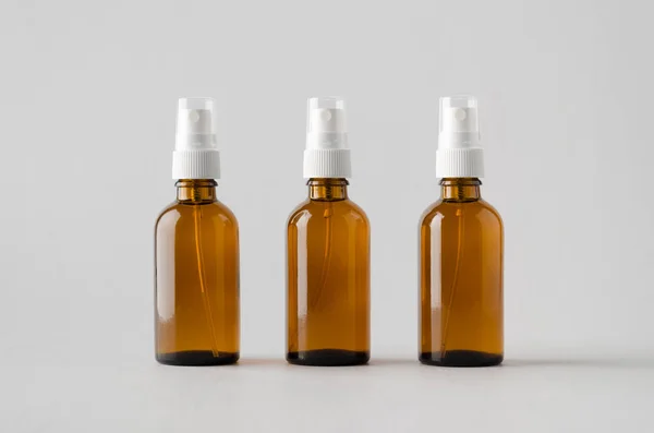 Amber Spray Bottle Mock Três Garrafas — Fotografia de Stock