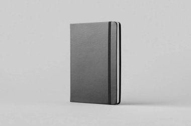 Gri arka planda siyah defter modeli. Ön taraf.