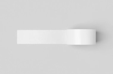 Gri arkaplandaki beyaz bantlanmış koli bandı..