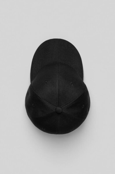 Black baseball cap mockup on a grey background.