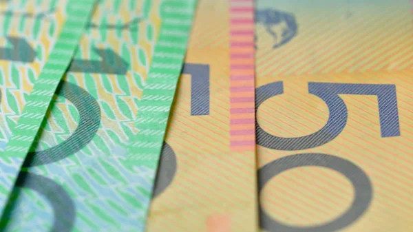 Macro closeup of Australian fifty and one hundred dollar notes. — Stock Photo, Image