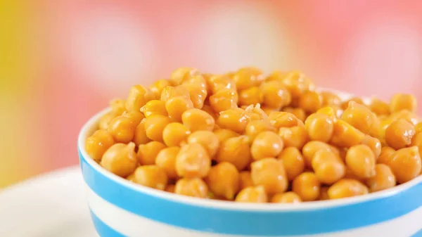 Chickpeas, garbanzo beans, in bowl with copy space. — Stock Photo, Image