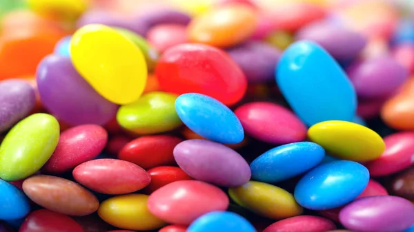 Macro primer plano de caramelos multicolor y gelatinas . —  Fotos de Stock