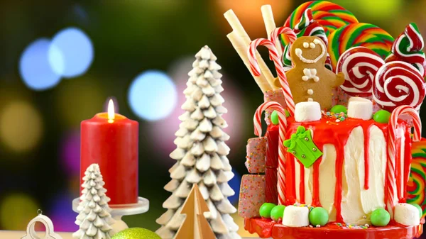 On trend Candy land Christmas drip cake. — Stock Photo, Image