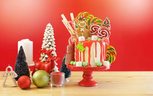 On trend Candy land Christmas drip cake. — Stock Photo, Image