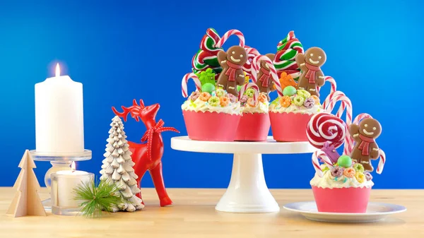 On trend candy land festive Christmas cupcakes. — Stock Photo, Image