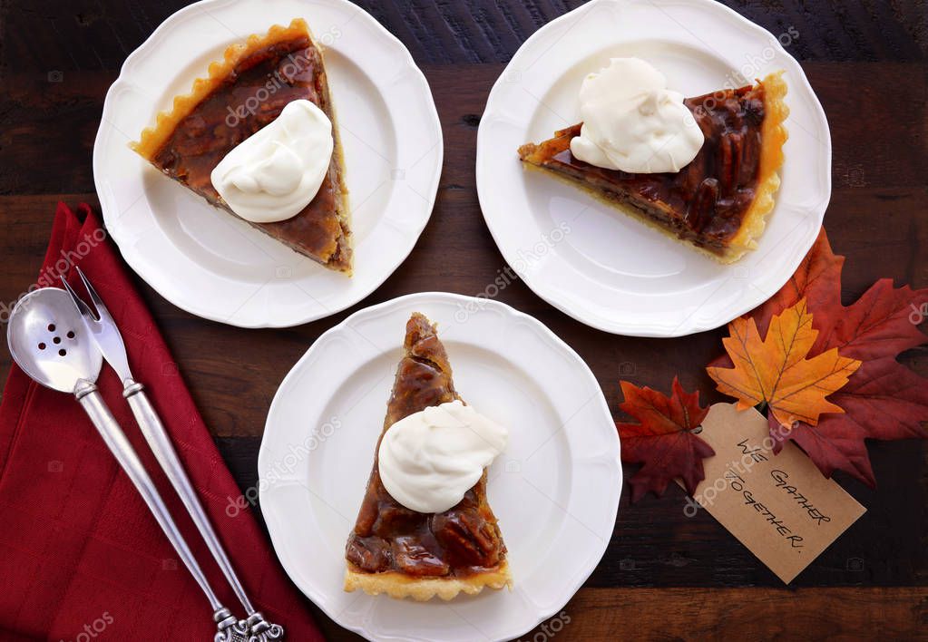 Traditional Happy Thanksgiving Pecan Pie in rustic setting.