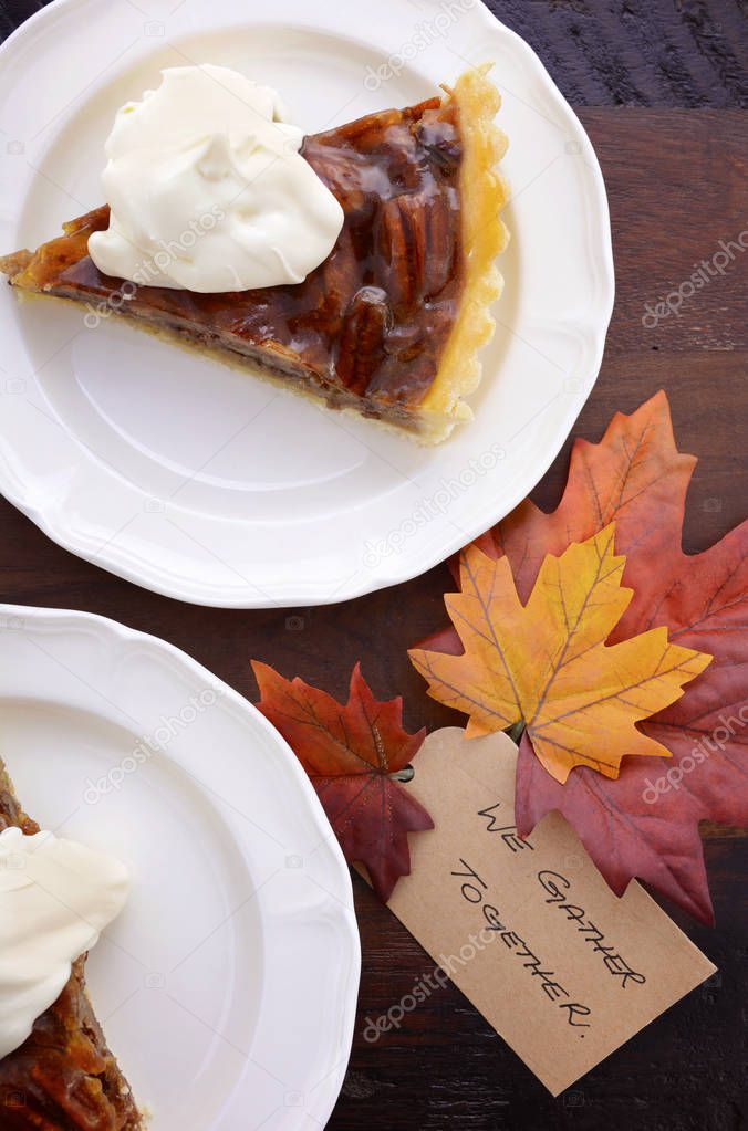 Traditional Happy Thanksgiving Pecan Pie in rustic setting.
