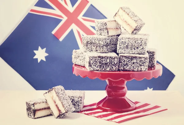 Traditional Australian Lamington Cakes with vintage wash filter. — Stock Photo, Image