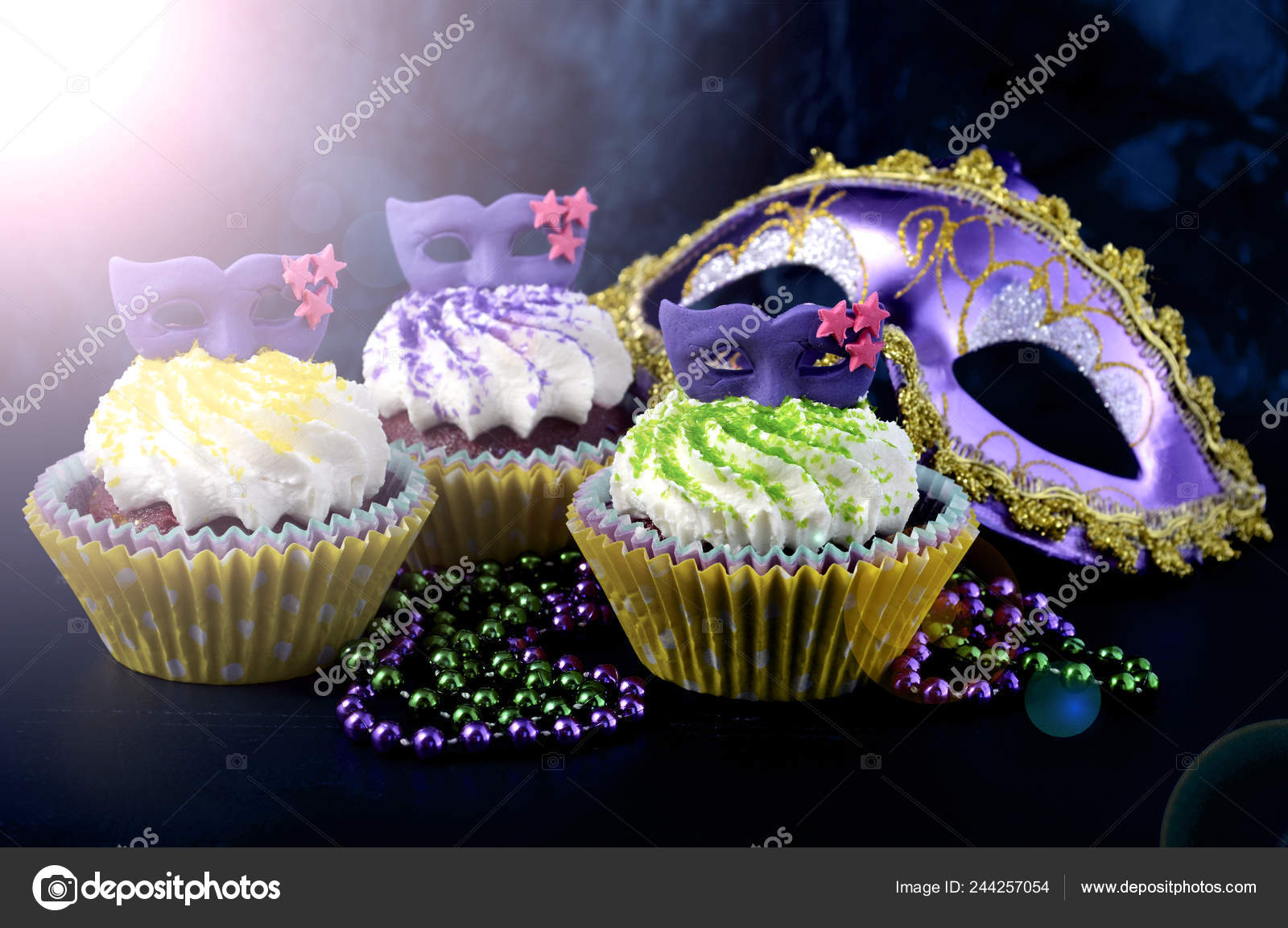 Mardi Gras Cupcakes With Face Mask Decorations With Lens Flare