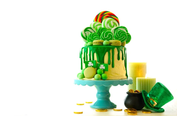 St Patricks Day tematu candy lollipop ziemi kapać ciasto. — Zdjęcie stockowe