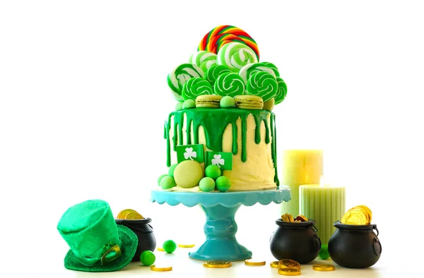St Patricks Day theme lollipop candy land drip cake. — Stock Photo, Image