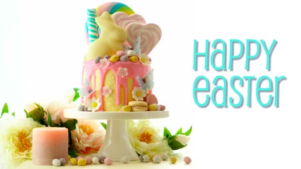 Easter candyland drip cake with chocolate bunny and animated text greeting. — Stock Video