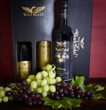 Wolf Blass gold and black label wines with display box. clipart