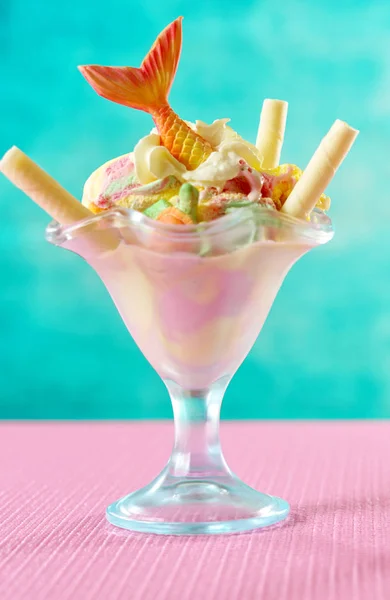 Mermaid sea theme rainbow ice cream sundaes on bright colorful background. — Stock Photo, Image