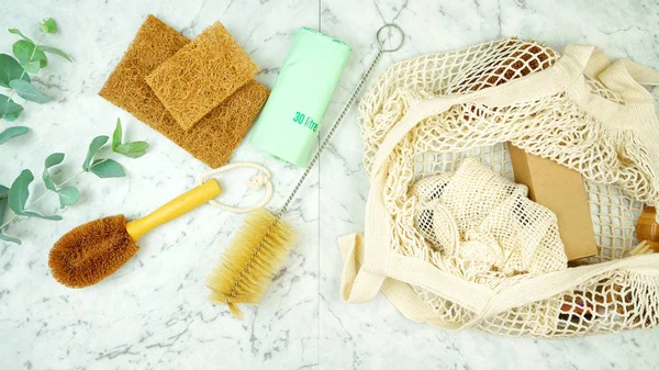 Zero-waste, plastic-free laundry and cleaning household products flatlay.