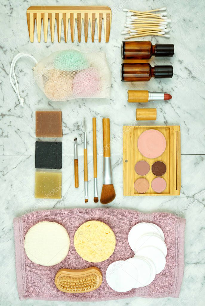 Zero-waste, plastic-free beauty and makeup products flatlay overhead.