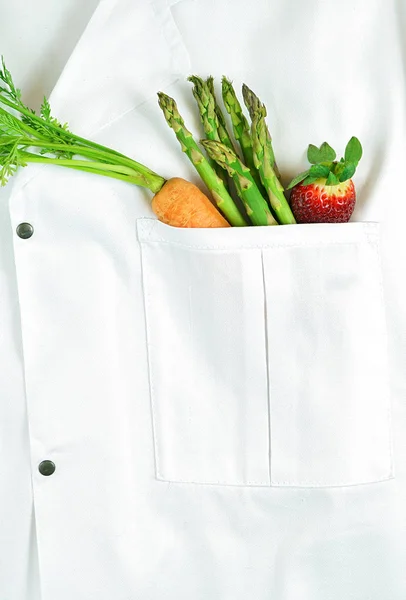 Healthy lifestyle concept with doctors lab coat and healthy food. — Stock Photo, Image