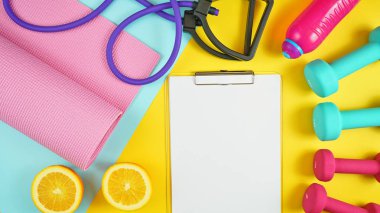 Modern renkli arka planda sağlık ve fitness konsepti.