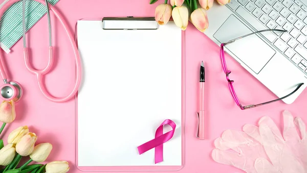 Pink Ribbon Breast Cancer Awareness Month doctors desk concept. — Stock Photo, Image