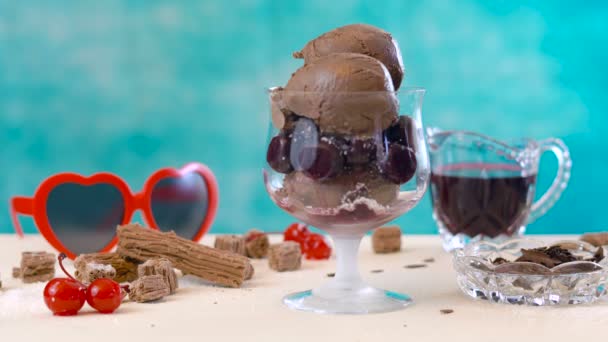 Making chocolate cherry and coconut ice cream sundaes. — Stock Video