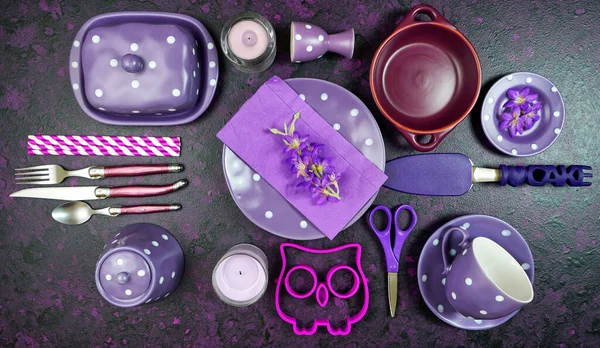 Purple aesthetic creative concept flatlay with purple theme tableware.