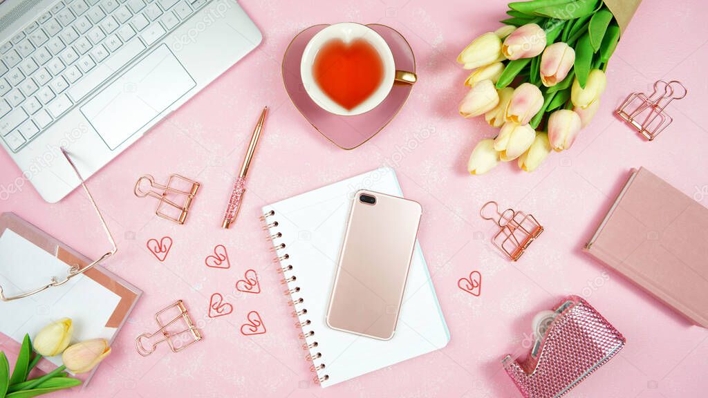 Feminine pink desktop workspace blog header overhead flat lay.