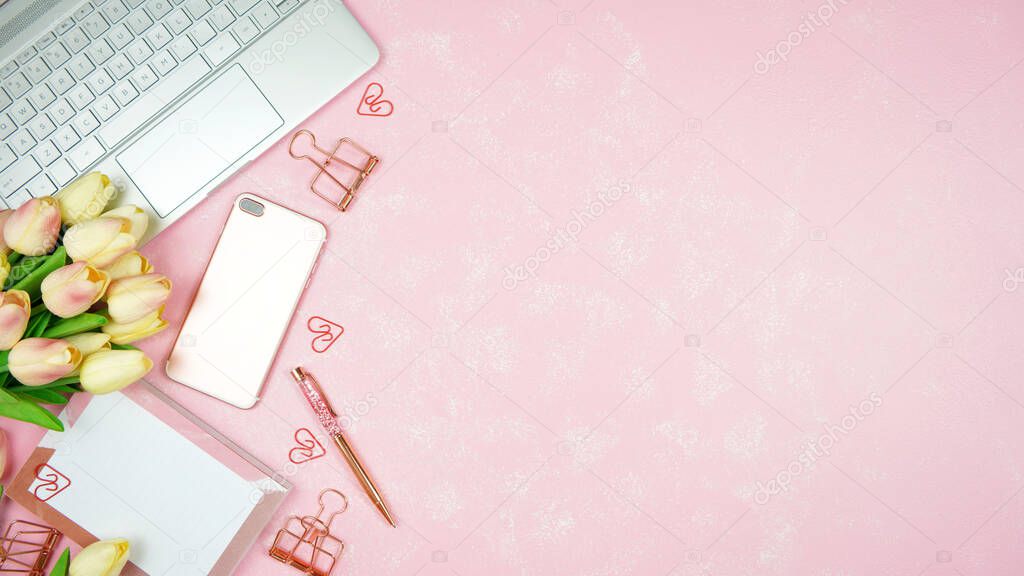 Feminine pink desktop workspace blog header overhead flat lay.