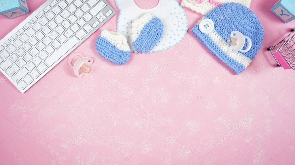 Baby nursery clothing bloggers desktop workspace blog header overhead flat lay.