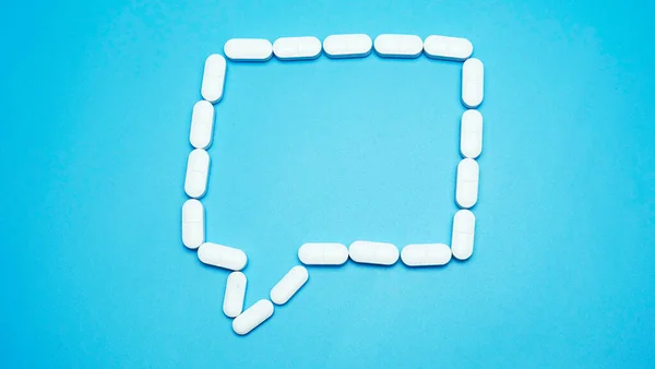 Tabletták Virus Covid Beszédszimbólum Keret Határ Kék Háttér Medicine Koncepció — Stock Fotó